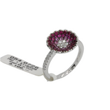 004_02_ 750er Weißgoldring mit einem blütenförmigen Ringkopf besetzt mit Brillanten, Rubinen und pinken Saphiren